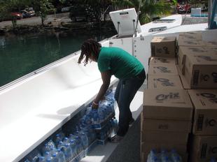 Image #2 - Hurricane Tomas Relief Effort (Packing the goods)